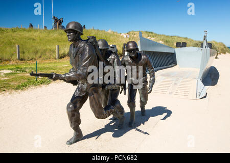 A memorial to American soldiers and Higgins boat landing craft at the Utah Beach D-Day Museum, Normandy, France. Stock Photo