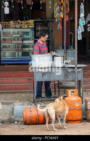 PONDICHERY, PUCUCHERRY, TAMIL NADU, INDIA - SEPTEMBER CIRCA, 2017. Local street food shop restaurant on the road at Pondichery, India. Cheap and very  Stock Photo