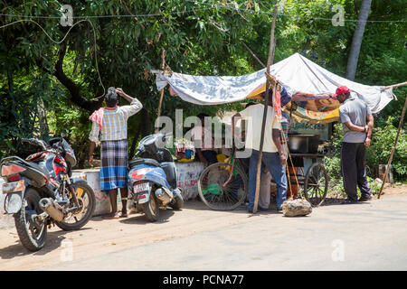 PONDICHERY, PUCUCHERRY, TAMIL NADU, INDIA - SEPTEMBER CIRCA, 2017. Local street food shop restaurant on the road at Pondichery, India. Cheap and very  Stock Photo