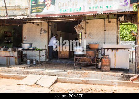 PONDICHERY, PUCUCHERRY, TAMIL NADU, INDIA - SEPTEMBER CIRCA, 2017. Local street food shop restaurant on the road at Pondichery, India. Cheap and very  Stock Photo