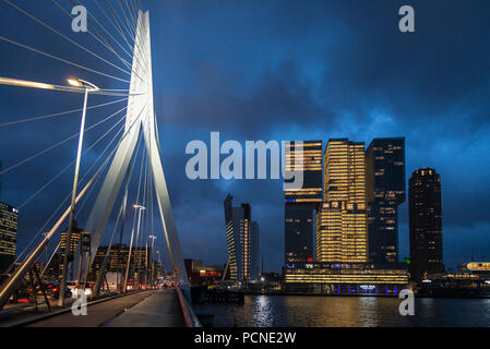 Early evening in Rotterdam. Showing Erasmus Bridge and De Rotterdam Stock Photo