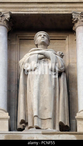 Statue of Saint on the facade of Saint Augustine church in Paris, France Stock Photo