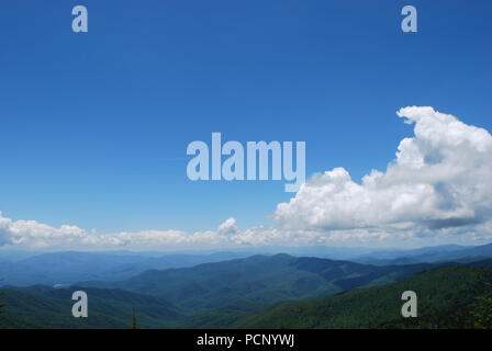 Mountains stream. Open horizon. Forest. Blue sky with scenic clouds. Vacation destination. Road trip. Hiking, climbing Stock Photo