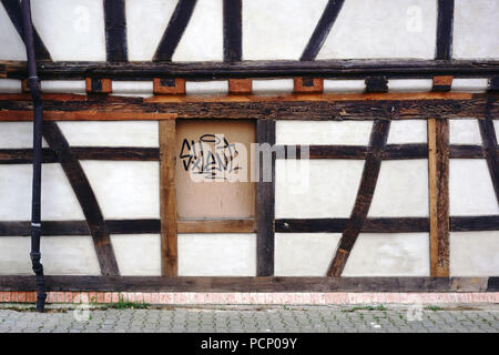 The beam construction and the wooden framework of a half-timbered house. Stock Photo