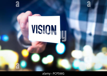 Vision, future ideas, forethought and development concept. Business man, marketing and branding professional or consultant holding card. Stock Photo