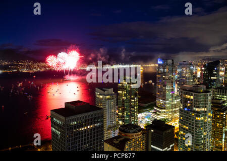 Aerial view of Downtown City during Canada Day fireworks. Taken in Vancouver, British Columbia, Canada. Stock Photo