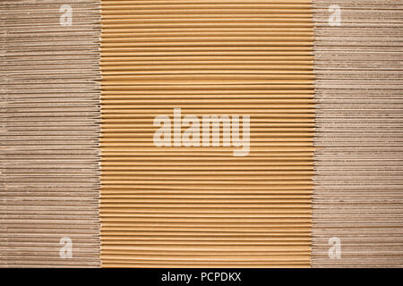 Stack of flat industrial folding cardboard packaging boxes Stock Photo