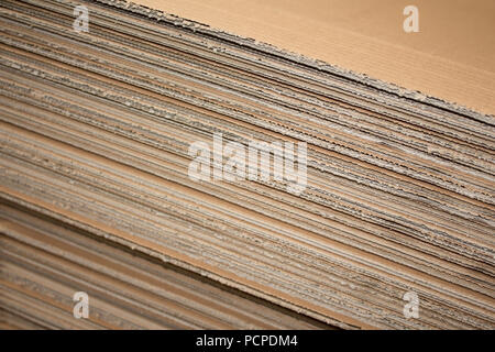 Stack of flat industrial folding cardboard packaging boxes Stock Photo