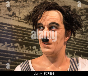 realistic reproduction figure of the famous actor Charlie Chaplin on permanent display at the Science Museum (MuSe) in Trento, Italy Stock Photo