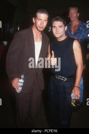 HOLLYWOOD, CA - MAY 30: (L-R) Actors Stephen Baldwin and Corey Feldman attend the First Annual Celebrity Pool Tournament to Benefit AIDS Project Los Angeles (APLA) on May 30, 1992 at the Hollywood Athletic Club in Hollywood, California. Photo by Barry King/Alamy Stock Photo Stock Photo