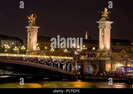 Night time over Pont Alexandre III bridge - Paris, France Stock Photo