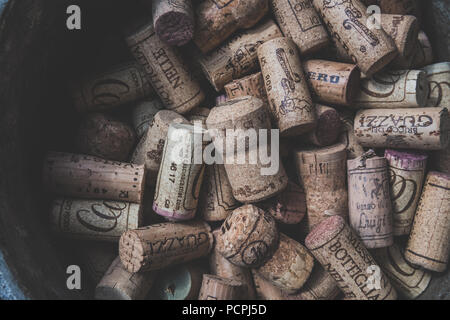 Close up of a used cork collection in a vintage style, mainly Italian wines. Stock Photo