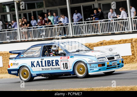 1989 Ford Sierra Cosworth RS500, originally driven by Andy Rouse, here driven by Calum Lockie at the 2018 Goodwood Festival of Speed, Sussex, UK. Stock Photo
