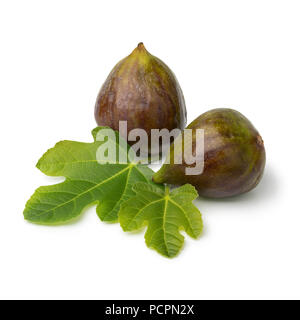 Pair of fresh ripe figs and leaves sisolated on white background Stock Photo