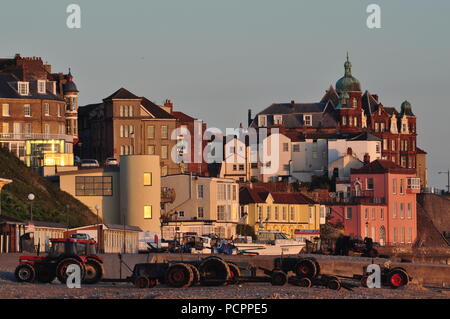 Cromer seafront  with crab boat trailers and tractors in early summer morning, Norfolk, England UK Stock Photo