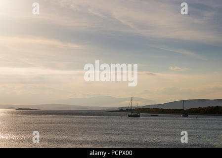 sunset over the Connel bridge and Lora waterfall Stock Photo