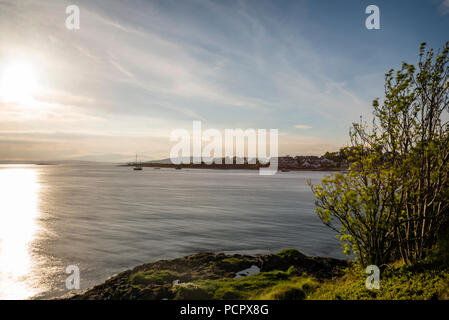 sunset over the Connel bridge and Lora waterfall Stock Photo