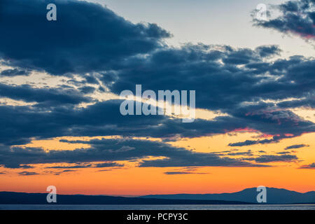 Clouds at sunset sky Stock Photo