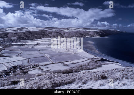 A wintertime infrared image of the view across Porlock Marshes from Bossington Hill in the Exmoor National Park in Somerset, England Stock Photo