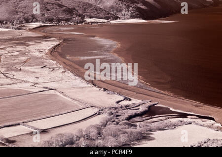 A wintertime infrared image of the view across Porlock Marshes from Bossington Hill in the Exmoor National Park in Somerset, England Stock Photo