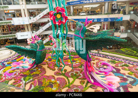 Two giant birds, made of flowers, in the center of the traditional flower carpet of the Santafe Shopping Center, in the El Poblado neighborhood of Med Stock Photo