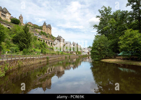 FRANCE, UZERCHE - JULY 12, 2018: Panorama of the picturesque medieval village with the river Vezere in front of it. Stock Photo