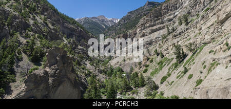 Rock walls of a mountain river canyon near Yellowstone National Park in the Rockies. Stock Photo