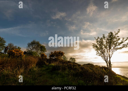 sunset over the Falls of Lora waterfall in a sunny spring evening Stock Photo