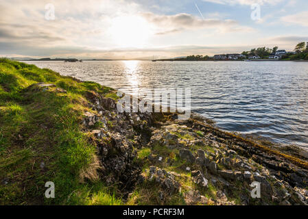 sunset over the Falls of Lora waterfall in a sunny spring evening Stock Photo