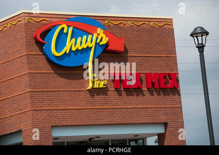 A logo sign outside of a Chuy's restaurant location in Westminster, Colorado, on July 23, 2018. Stock Photo
