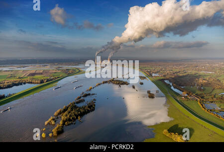 Duisburg-Walsum, Rhine River with view of STEAG Voerde power plant with cloud of smoke reflected by the Rhine water, inland shipping, freighter, flood, aerial view of Duisburg, Ruhr area Stock Photo