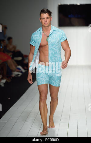 MIAMI BEACH, FLORIDA - JULY 16: Janell Williams walks the runway for