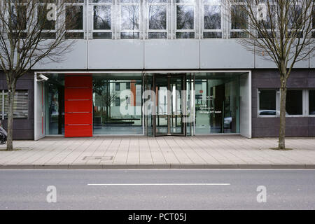 Glass entrance of the DB Cargo AG headquarters in Mainz with a modern entrance with revolving door Stock Photo