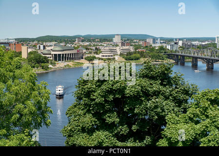 Gatineau, Quebec, Canada.  Looking northwest across Ottawa River in summer at Gatineau and Alexandra Bridge from Parliament Hill in Ottawa, Ontario. Stock Photo