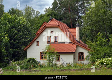 White vintage house in the forest photo Stock Photo