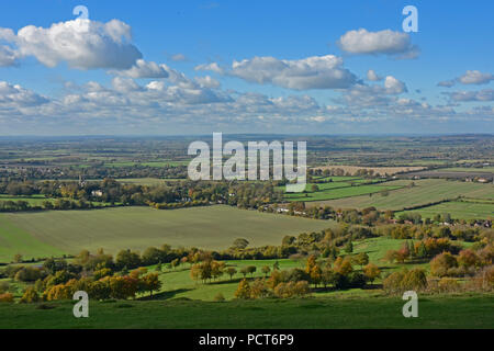 Bucks - Chiltern Hills - view from Coombe Hill over the Aylesbury Plain - sunlight - early autumn colours - cloud flecked blue sky