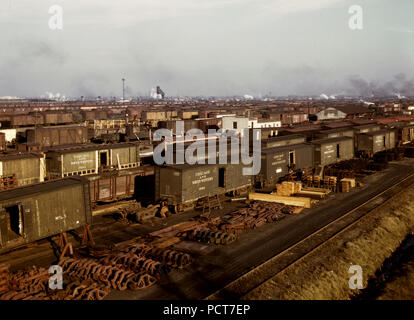 Freight cars being maneuvered in a Chicago and Northwestern [i.e. North Western] railroad yard, Chicago, Ill. December 1942 Stock Photo