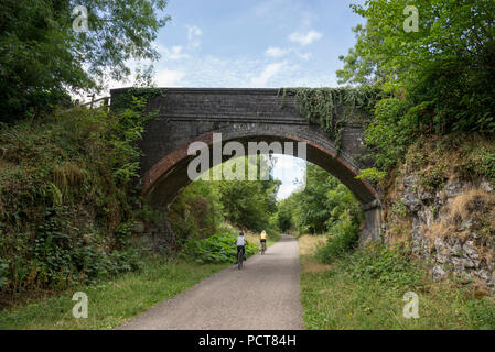 Cycists on the Monsal trail between Buxton and Bakewell in the peak District national park, Derbyshire, England. Stock Photo