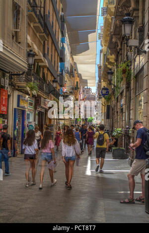 HDR image of people walking along Calle Traperia in Murcia Spain Stock Photo