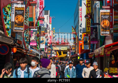 People stroll along the famous Ameyoko shopping street in Ueno District Stock Photo