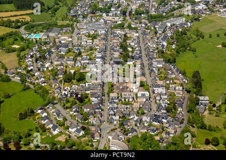 General view of Schmallenberg with Oststraße and Weststraße and Catholic Parish Church of Saint Alexander, roads running parallel, Schmallenberg, Hochsauerland (district), North Rhine-Westphalia, Germany Stock Photo