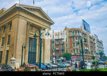 ALEXANDRIA, EGYPT - DECEMBER 18, 2017:  The facade of Chamber of Commerce faces Omar Lotfy street and neighboring with Italian styled historical mansi Stock Photo