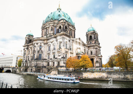 Beautiful view of Berliner Dom (Berlin Cathedral) at famous Museumsinsel (Museum Island) with excursion boat on Spree river in beautiful evening light Stock Photo