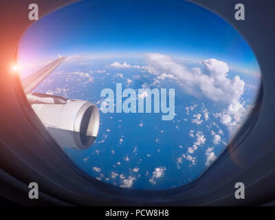 Classic image through aircraft window onto jet engine Stock Photo