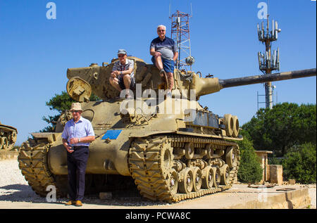 11 May 2018 Men on top of a discarded Sherman Tank on HarAdar (Radar Hill) Monument outside Jerusalem israel. The site is dedicated to the memory of t Stock Photo