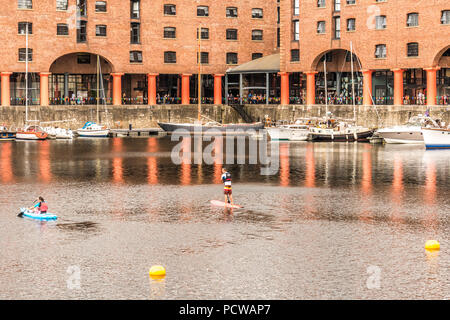 Albert Docks Liverpool now developed into a successful tourist hot spot in Liverpool United Kingdom Stock Photo