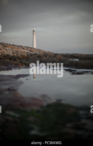 Slangkop Lighthouse near Kommetjie, Cape Town, Western Cape Province, South Africa as built in the early 1900s and is now a popular tourist spot. Stock Photo