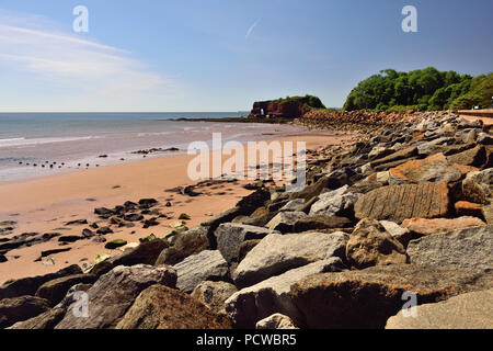 Dawlish Warren beach near Langstone Rock, showing rock armour along the sea wall. Stock Photo