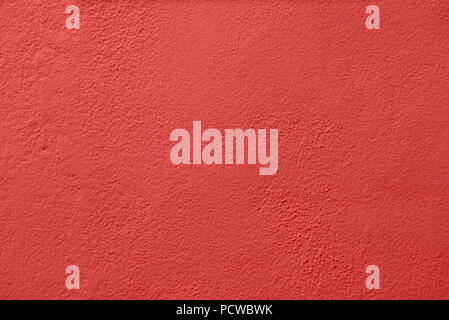 Concrete wall painted with a red paint Stock Photo