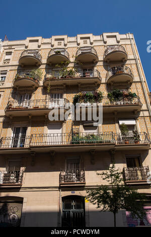 Decorative facade of a residential building on Nou de La Rambla in Barcelona, Spain Stock Photo